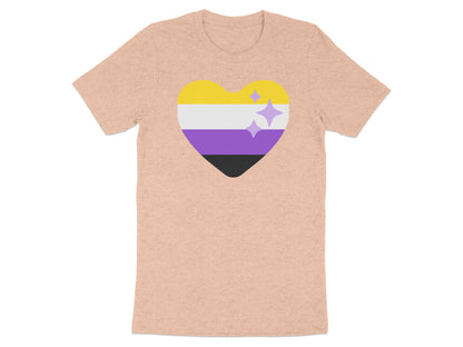 Peach t-shirt with a non-binary pride heart and sparkles design.