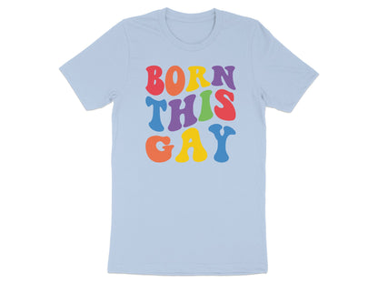 Light blue t-shirt with colorful "BORN THIS GAY" text in a retro font.