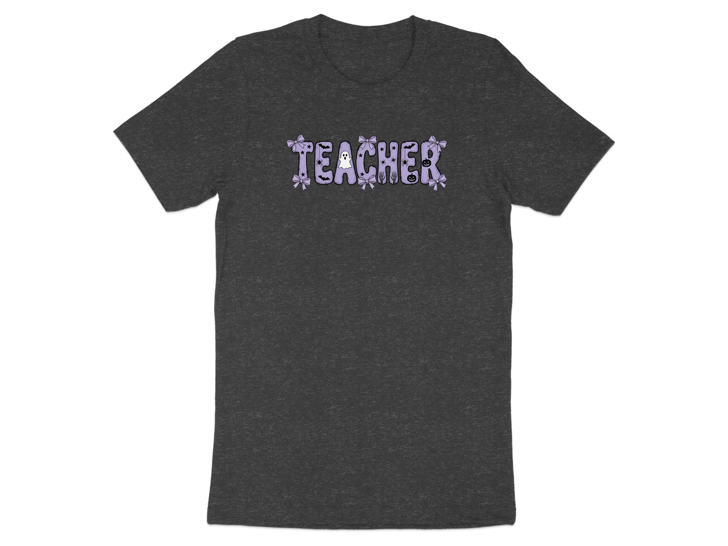 Dark t-shirt with the word "TEACHER" in purple, decorated with Halloween motifs.