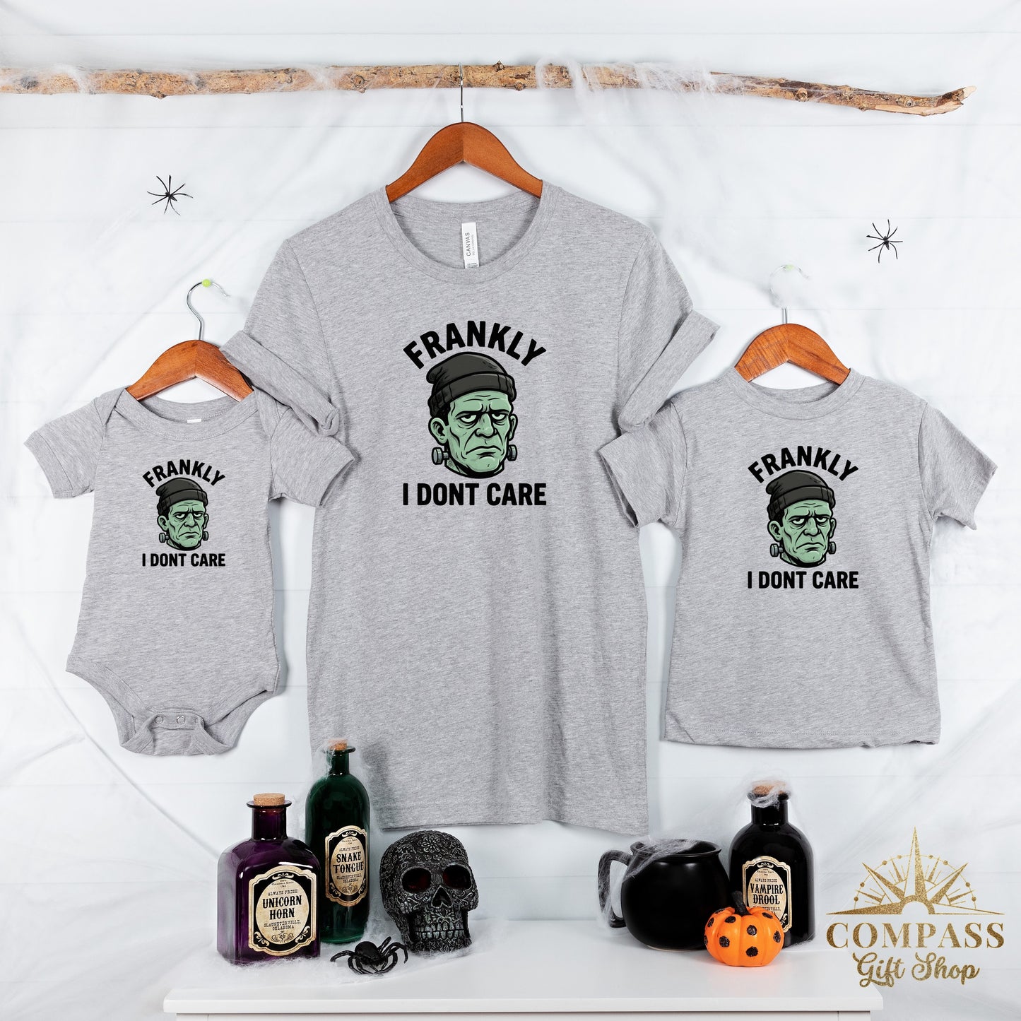 Three gray t-shirts with Frankie's monster that say "Frankly I Don't Care".