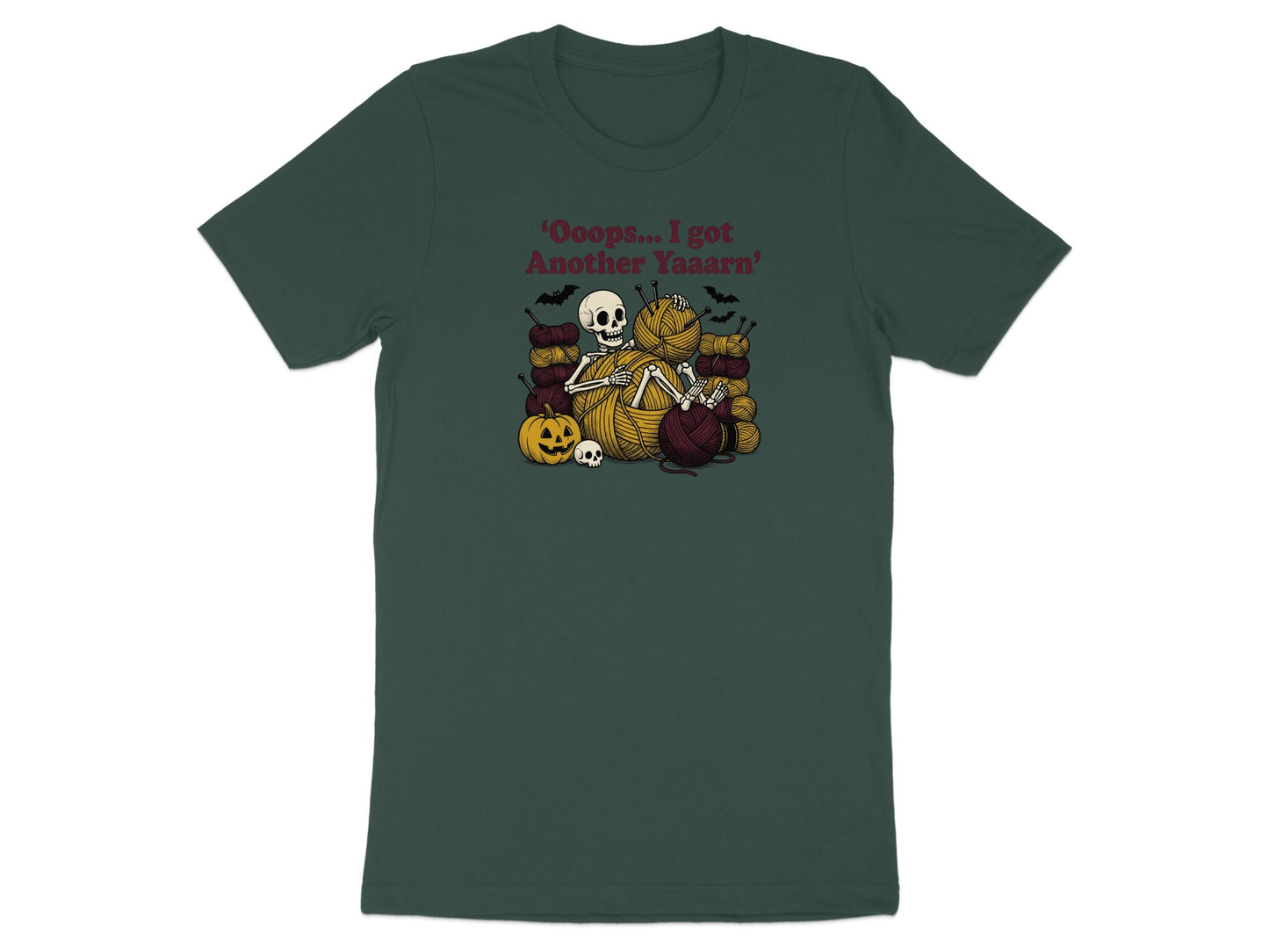 Skeleton with yarn, pumpkin, and bats, text says "Oops... I got Another Yaaarn".