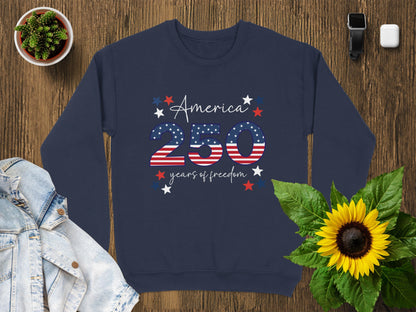 Navy sweatshirt with "America 250 Years of Freedom" text and stars.