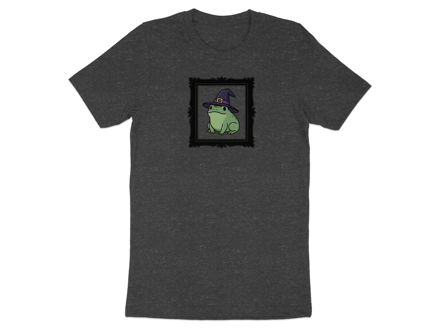 Dark gray t-shirt with a black framed illustration of a green frog wearing a witch hat.