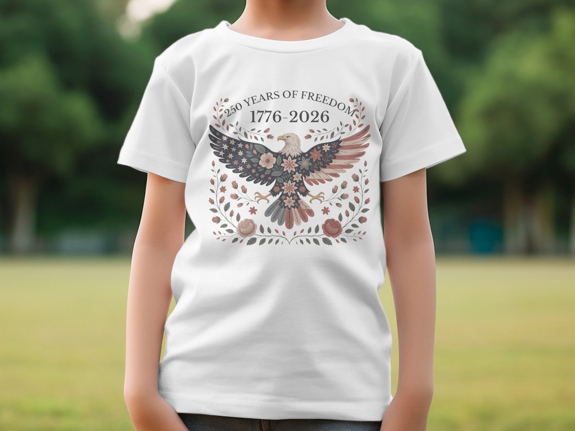 White t-shirt with patriotic eagle design and "250 Years of Freedom 1776-2026" text.