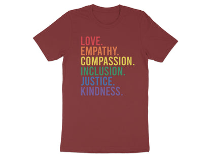 Maroon t-shirt with rainbow text: LOVE, EMPATHY, COMPASSION, INCLUSION, JUSTICE, KINDNESS.