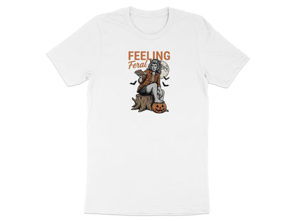 Graphic of a werewolf woman with text "FEELING Feral" on a white t-shirt.