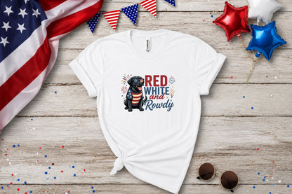 White t-shirt with black dog wearing sunglasses and American flag bandana, text "Red White and Rowdy".