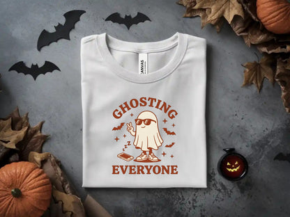 White t-shirt with ghost wearing sunglasses and text "Ghosting Everyone".