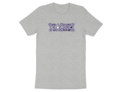 Grey t-shirt with "TEACHER" in purple Halloween-themed font and graphics.