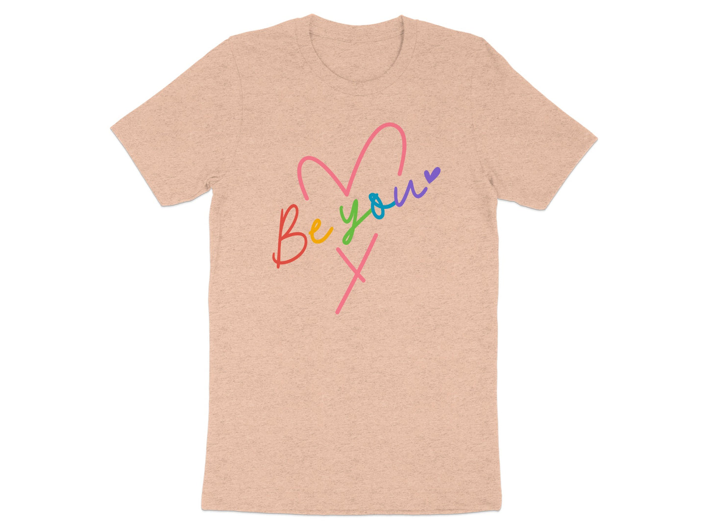Peach t-shirt with "Be You" text and rainbow heart graphic.