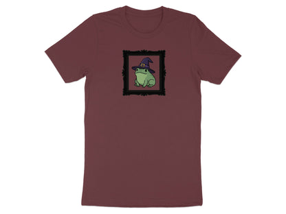 Maroon t-shirt with a framed illustration of a frog wearing a witch hat.